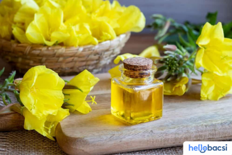 Hình ảnh một dược sĩ hoặc chuyên gia sức khỏe đang đưa ra lời khuyên về cách sử dụng tinh dầu hoa anh thảo.