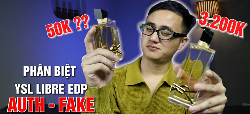 Ban tay cam chai nuoc hoa YSL nu, ben canh la mot chai khac co the la hang fake, hinh anh nhan manh viec kiem tra bao bi va chai